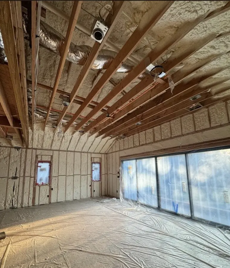 Interior walls and ceiling insulated with spray foam during new construction in Rutherford